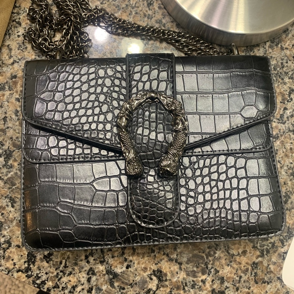 Bundle is 2 purses bought from Shein. Used once
